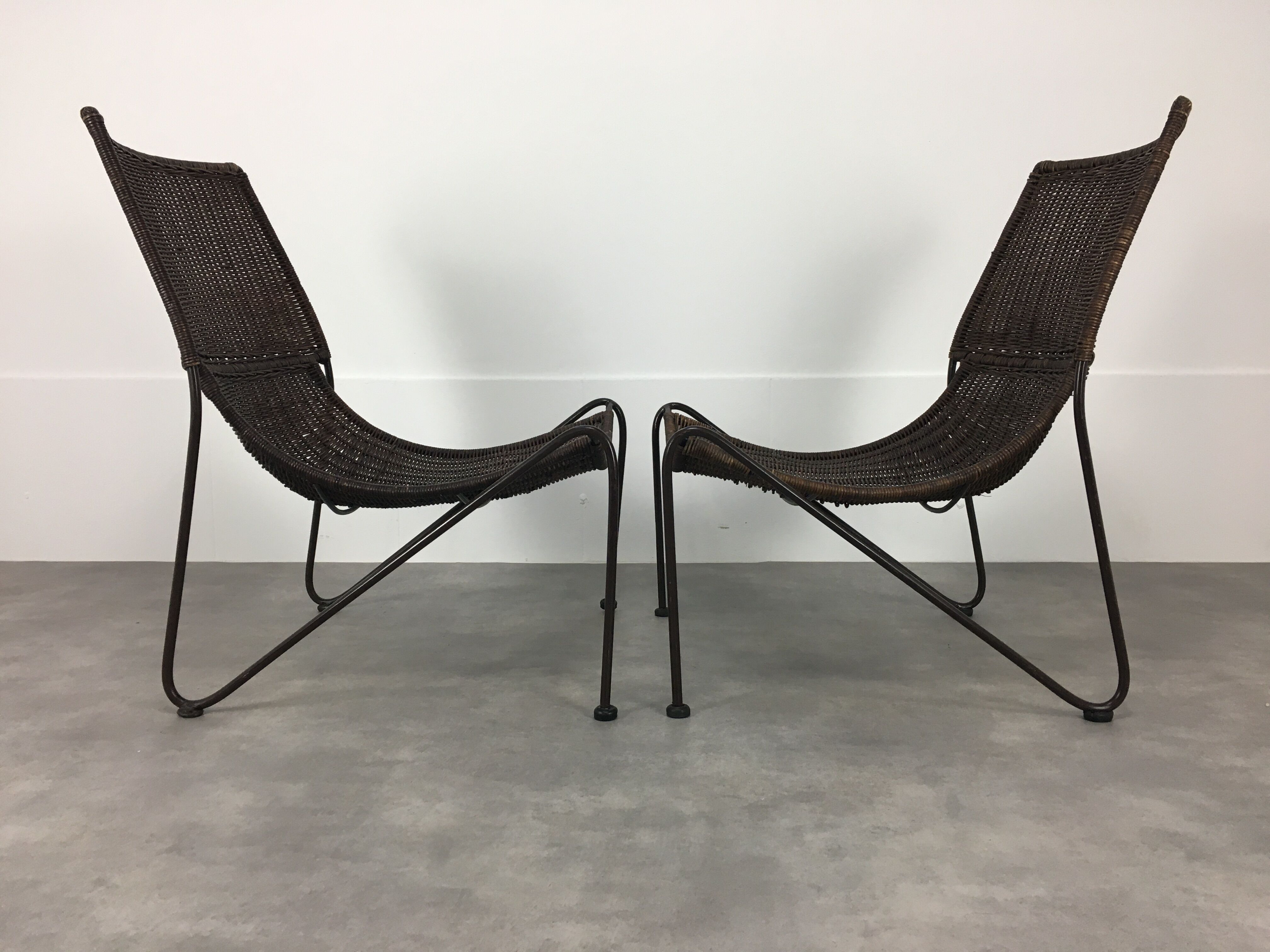 Pair of rattan and steel wire armchairs by frederick weinberg