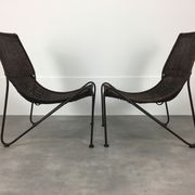 Pair of rattan and steel wire armchairs by frederick weinberg
