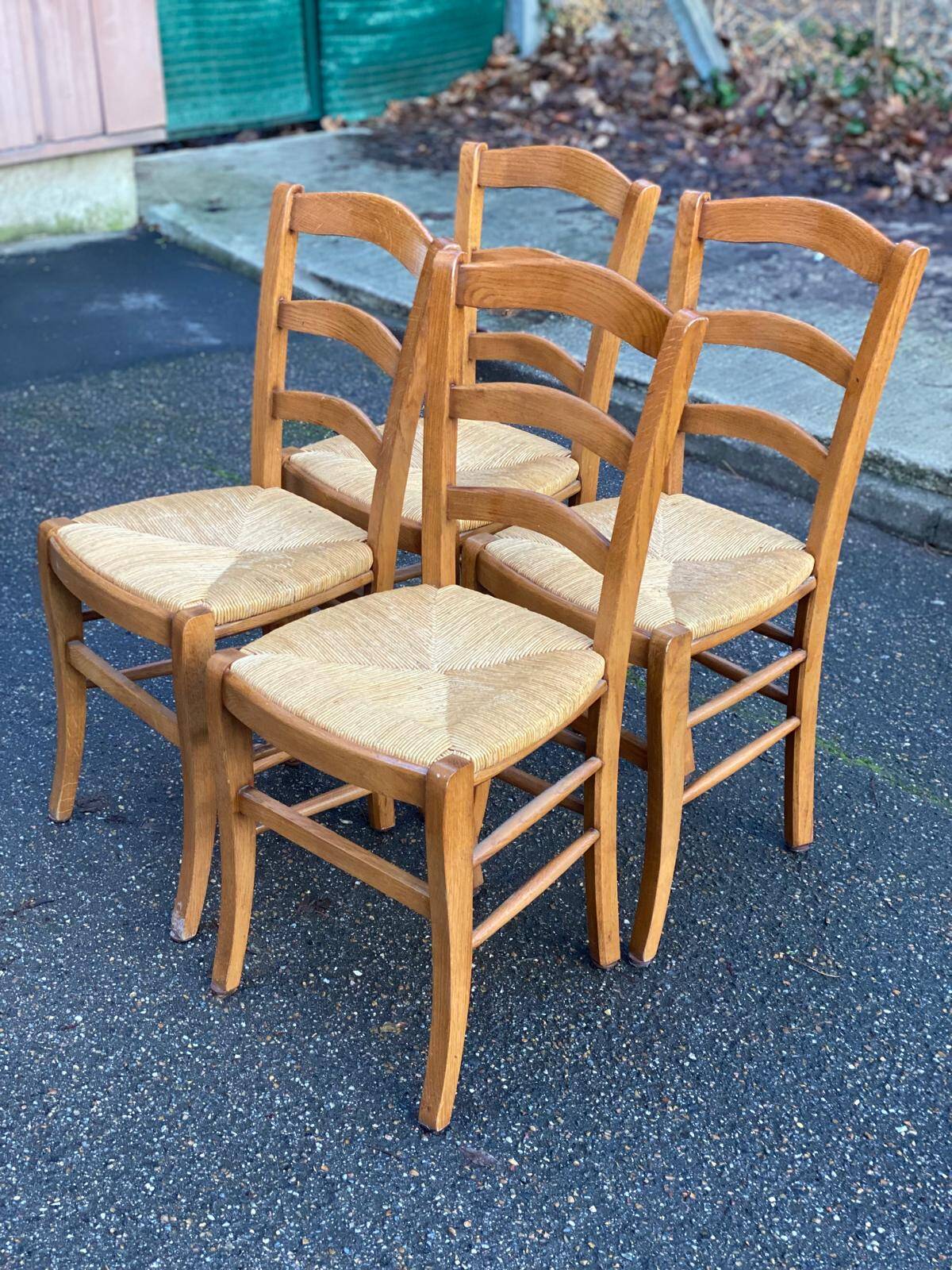 4 solid wood straw-seated Louis Philippe chairs, oak, 20th century.