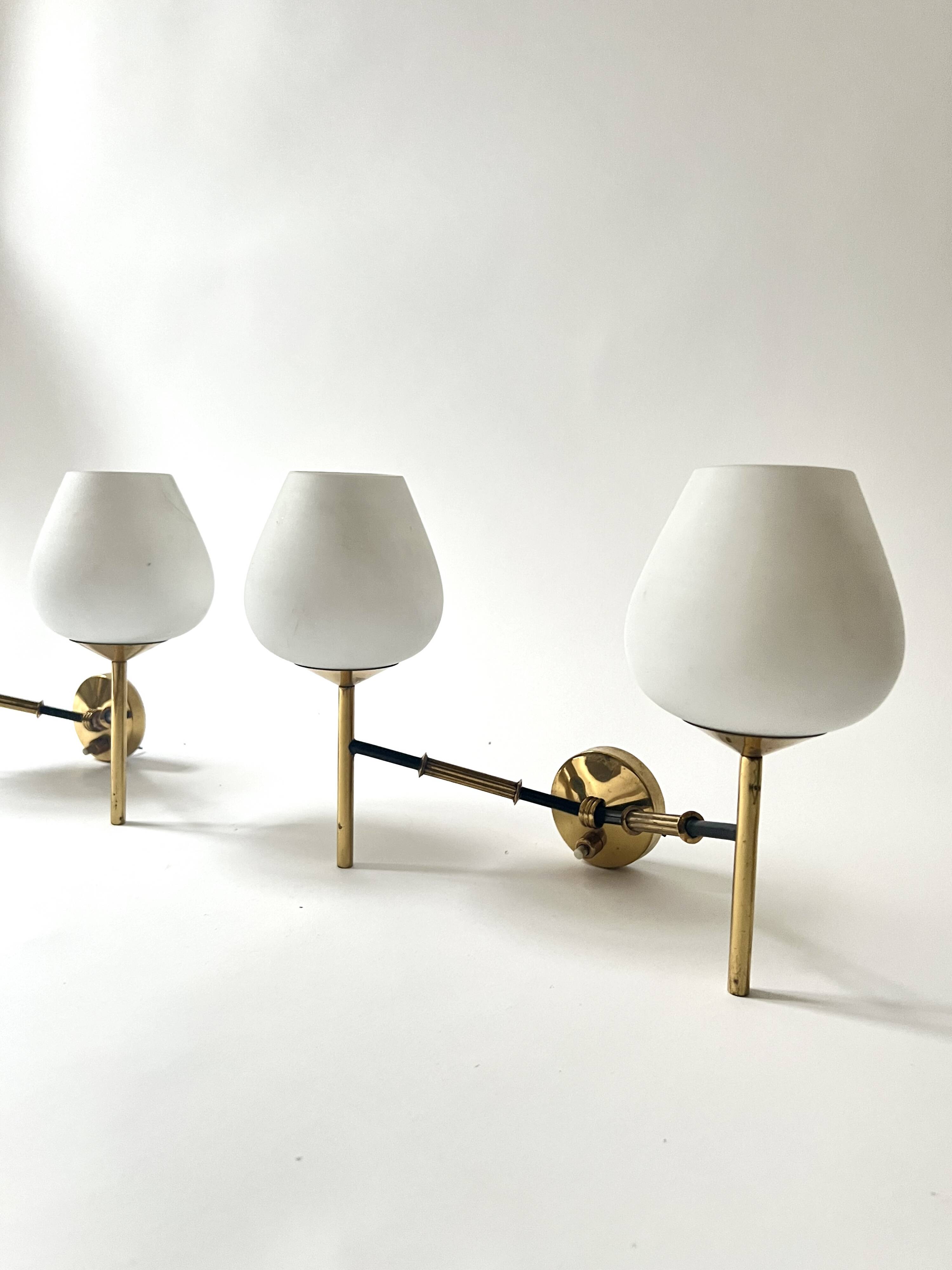 2 double wall lights in brass and white opaline glass, Arlus design 1950