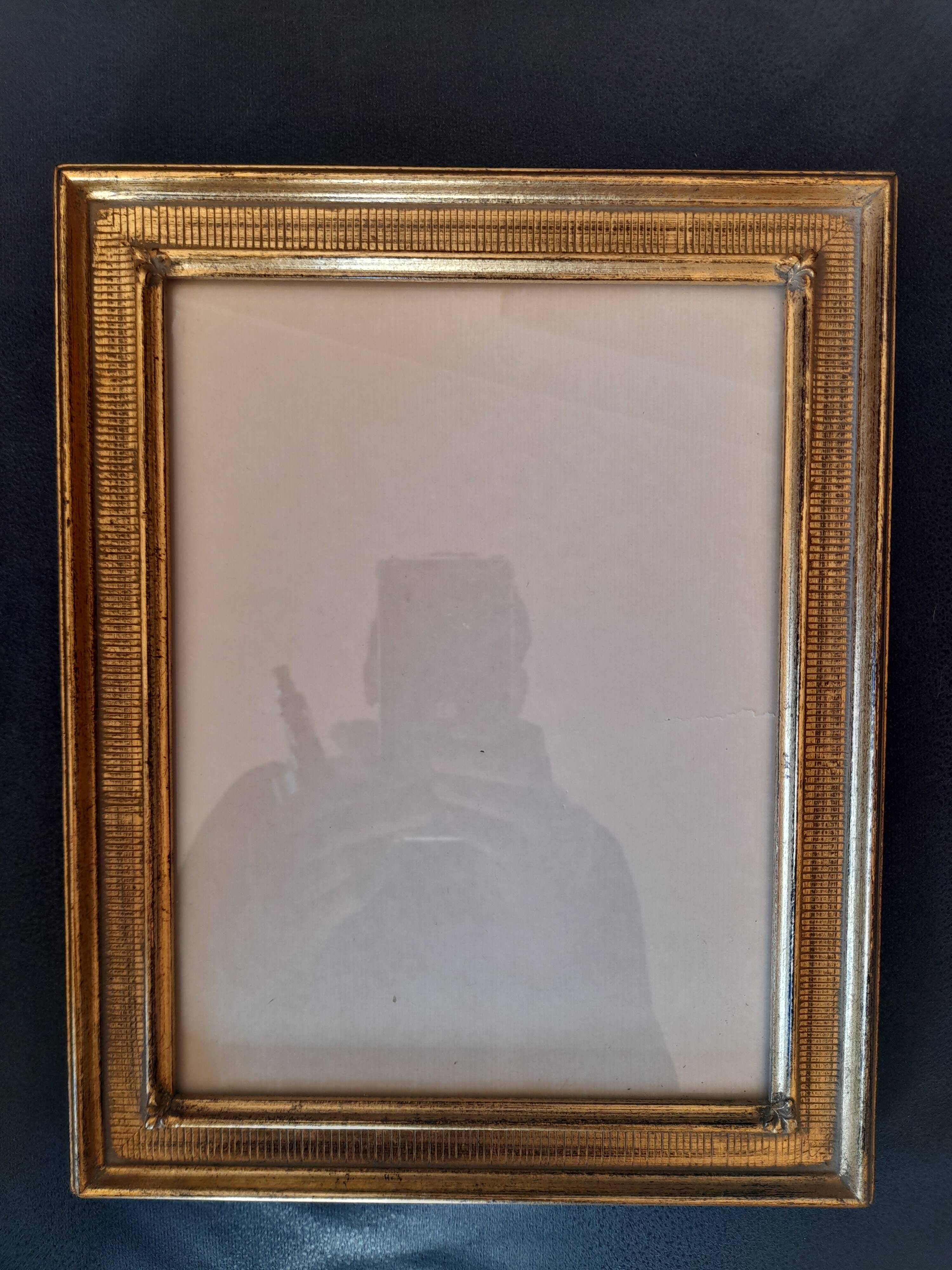 Antique frame with striated gilding