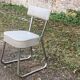 Set of 2 chairs and 1 armchair from the 70s in chrome metal and faux leather.