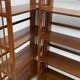 Pair of folding wooden bookcases, 4 shelves, 1950