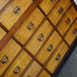 School cabinet bank of vintage Dutch drawers in mid-twentieth century pine