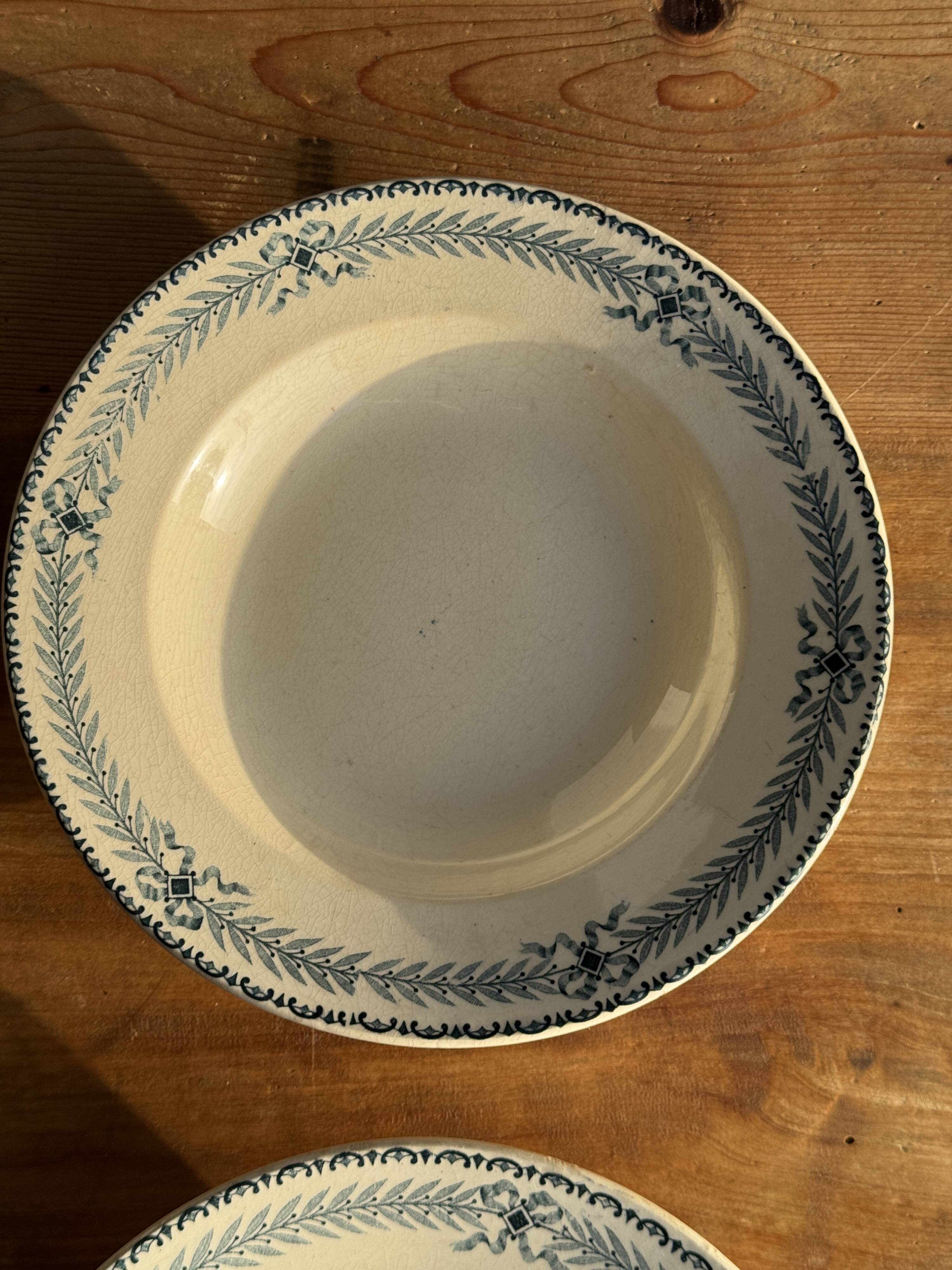 Set of 4 vintage deep plates in faience with blue decoration by Boulenger & Cie D2.
