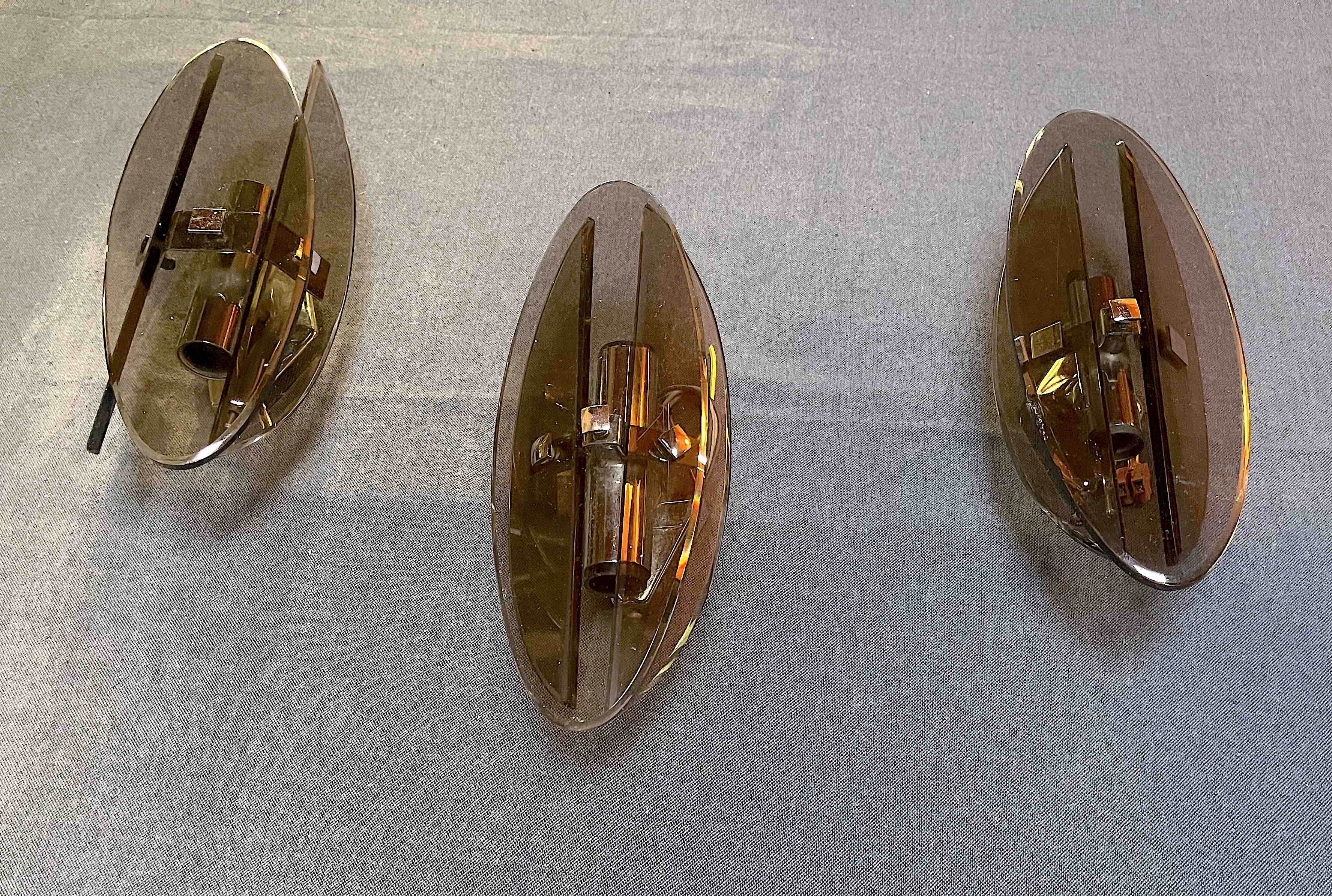 Four Veca wall lights, smoked glass, double light, Italy 1970's