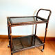 Rattan and smoked glass rolling service