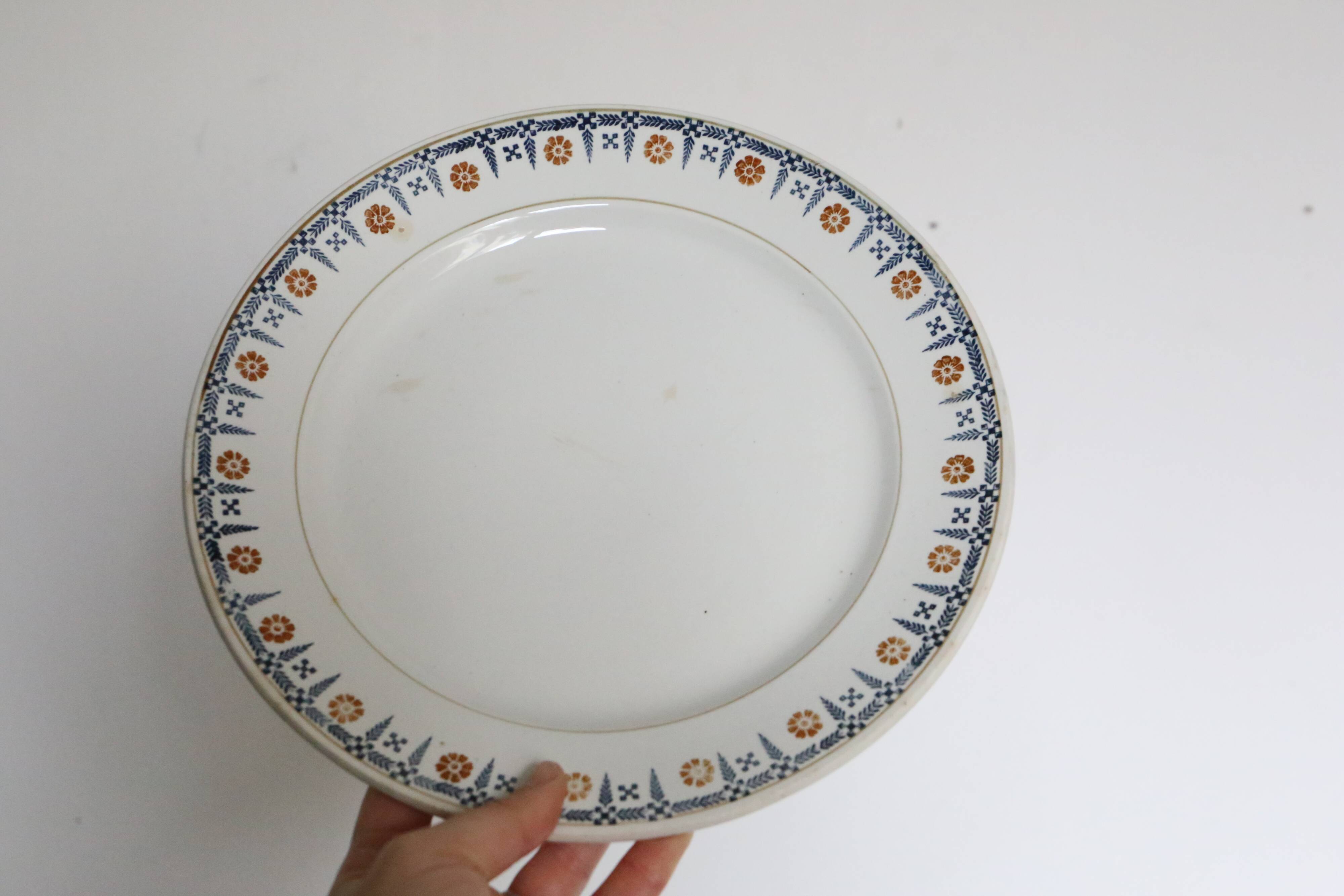 Round dish and flat Terre de Fer, Saint Amandinoise, 1930