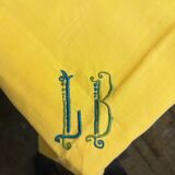 Small vintage yellow embroidered tablecloth and 12 napkins.