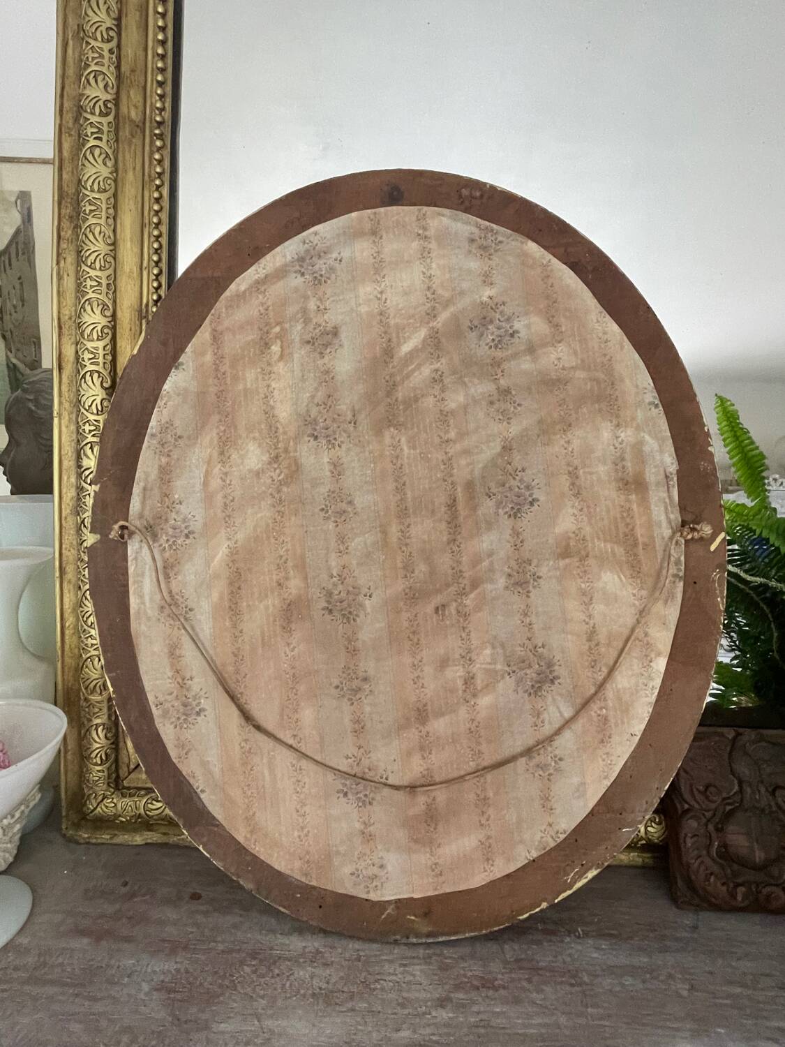 58cm patinated gilded wood mirror