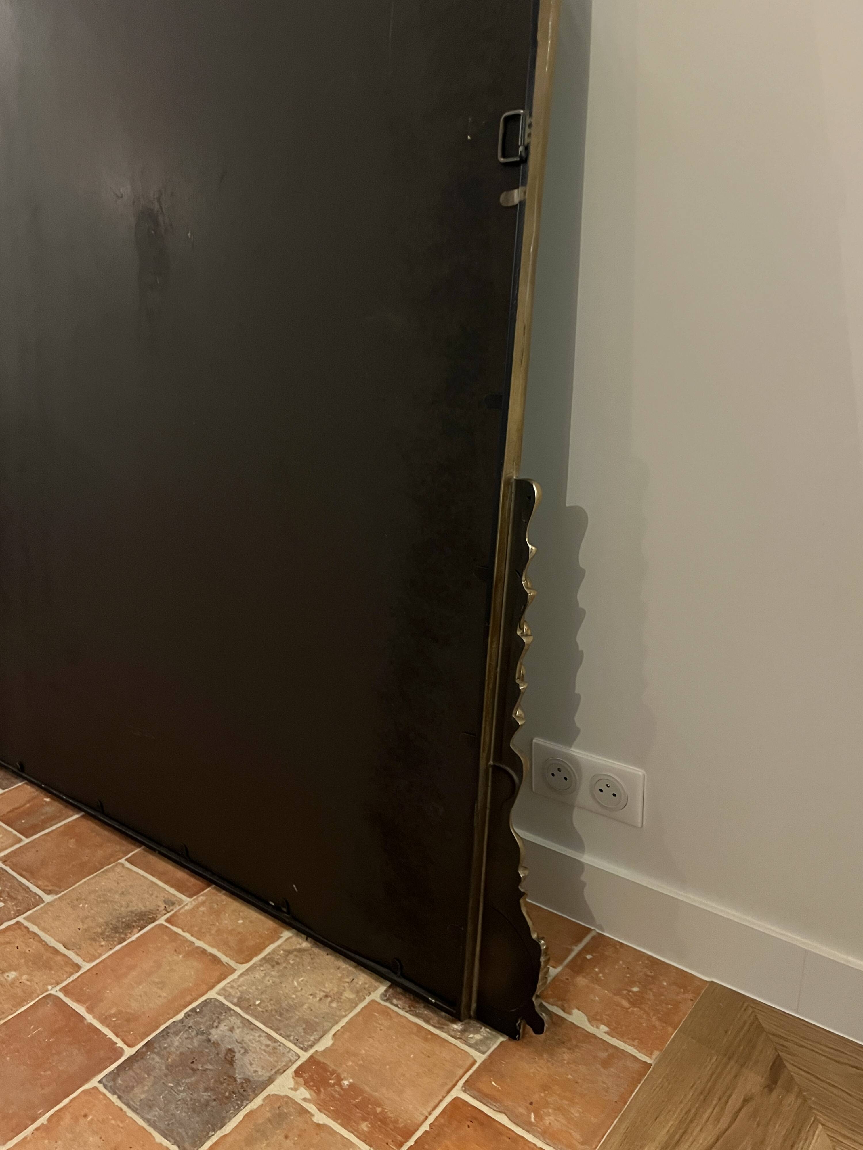 Large gilded mirror with pediment