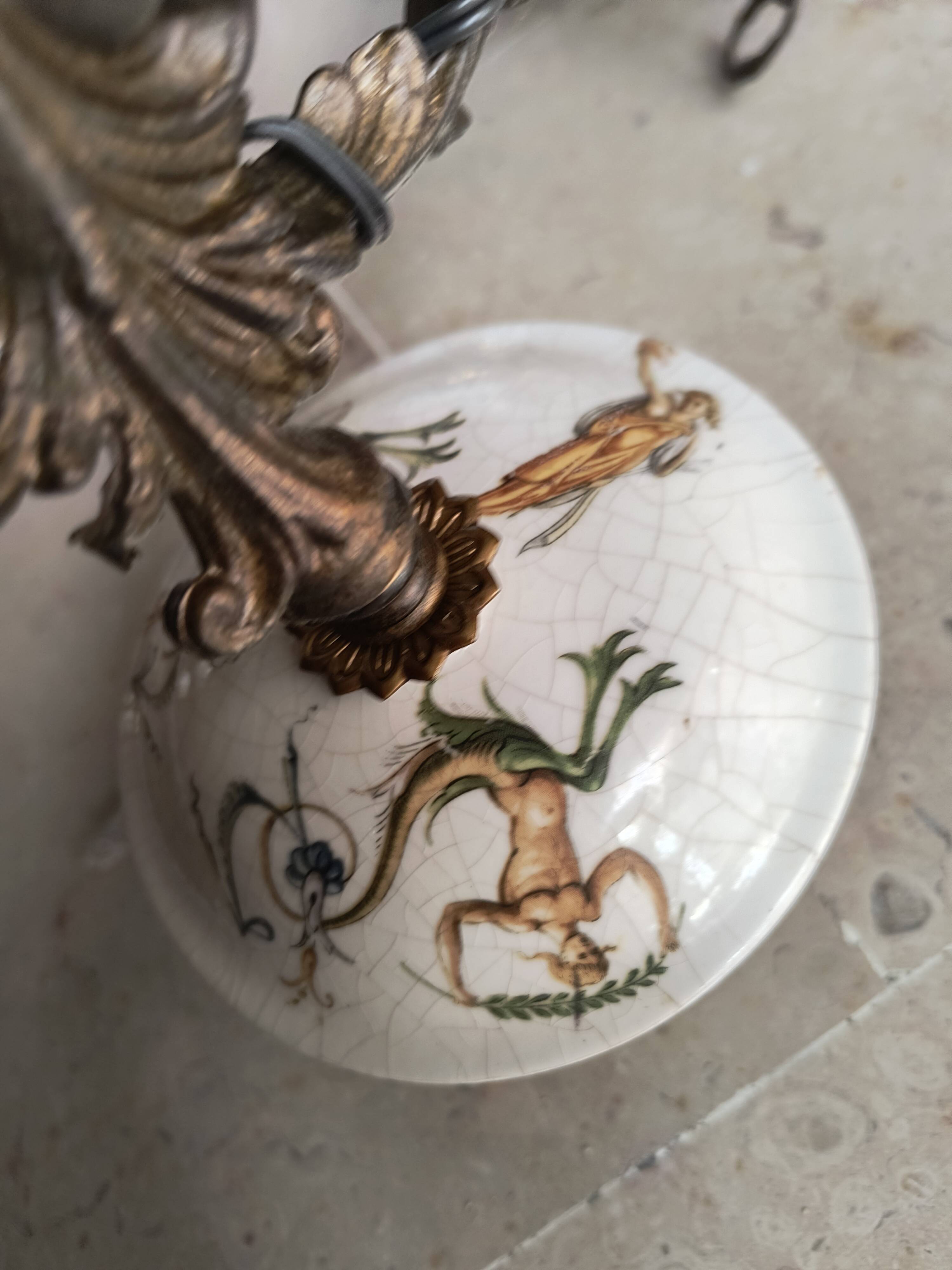 Lustrous bronze, copper and gien-style earthenware.