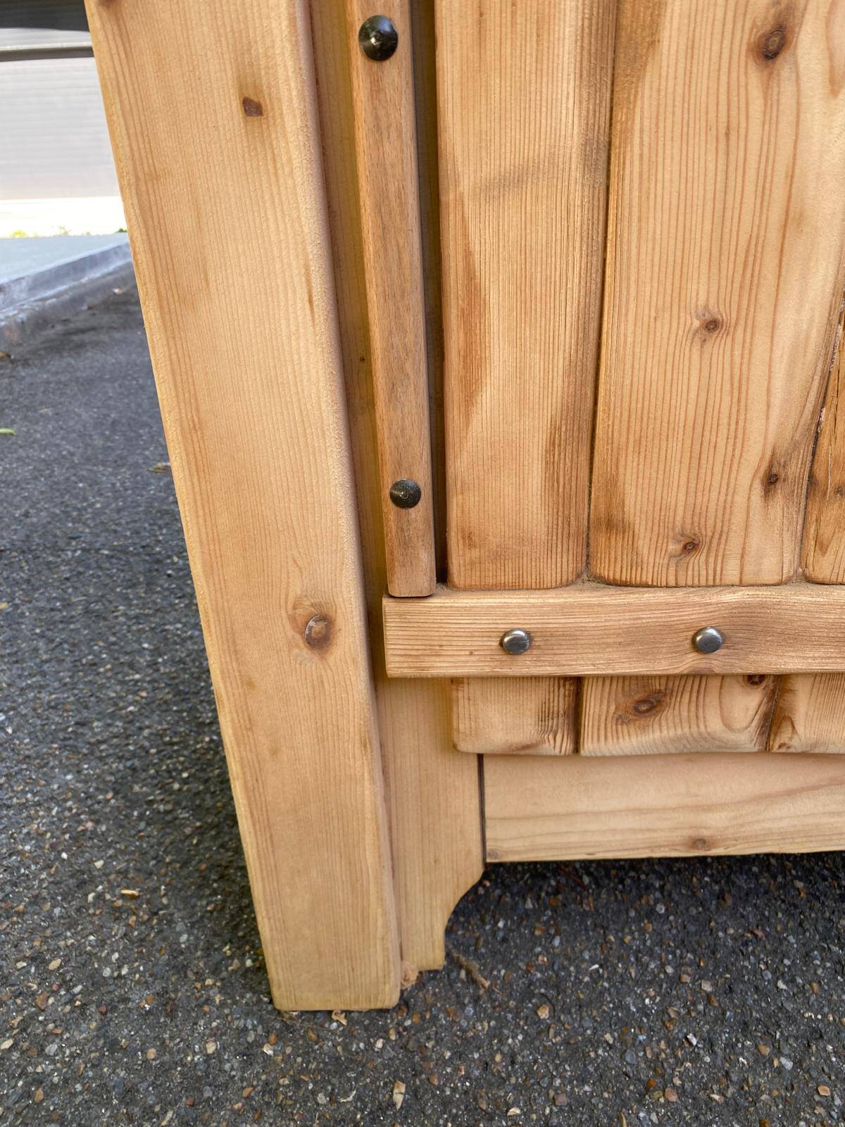 Row of renovated light solid wood chalets from the 1970s.