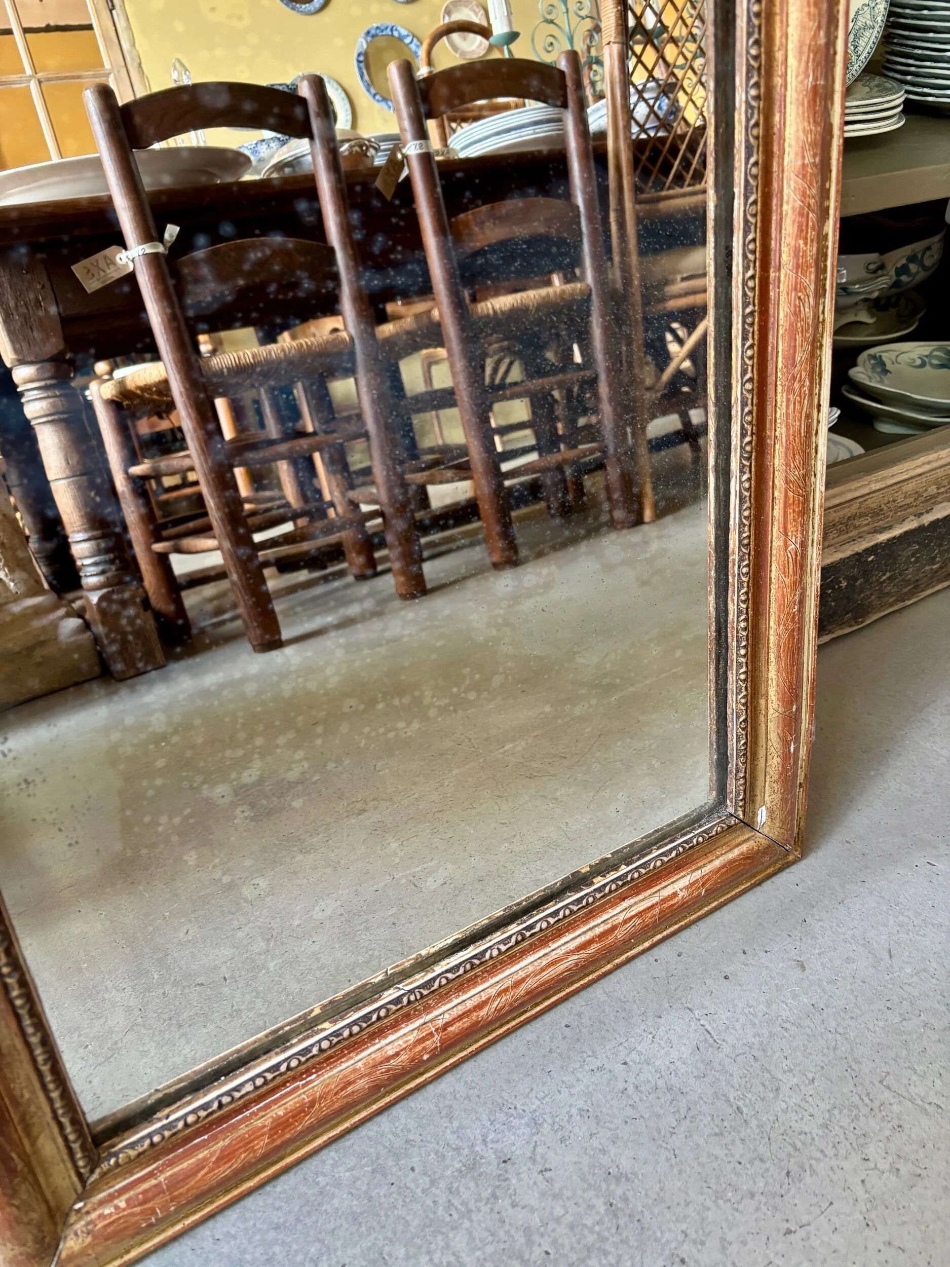 Louis Philippe mirror in gilded stucco ☐ 63.5 x 51 cm
