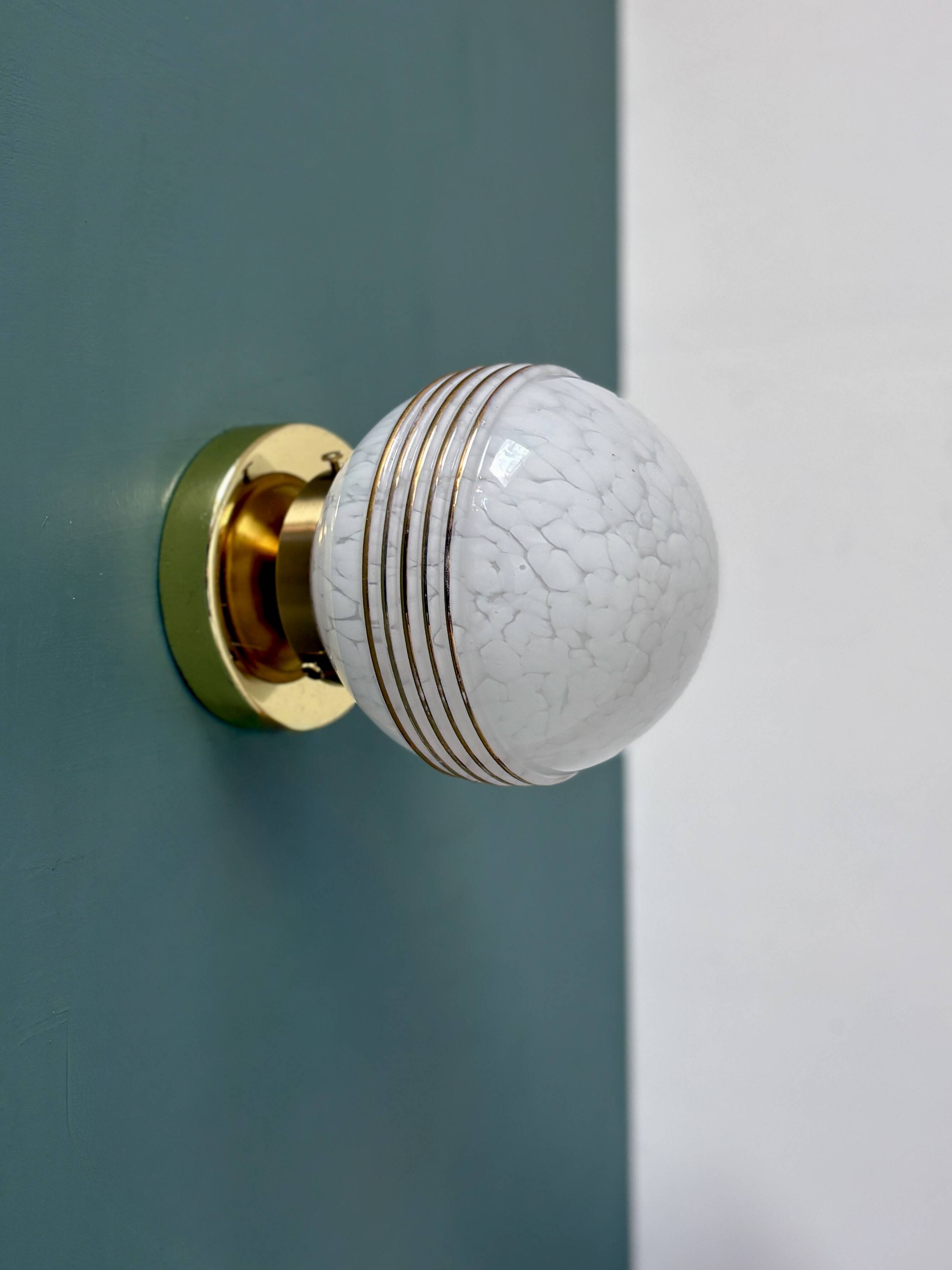 Vintage glass globe wall or ceiling light in white and gold from Clichy.