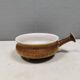 Small ceramic bowl with handle, in golden colours. Danish 1960-70s