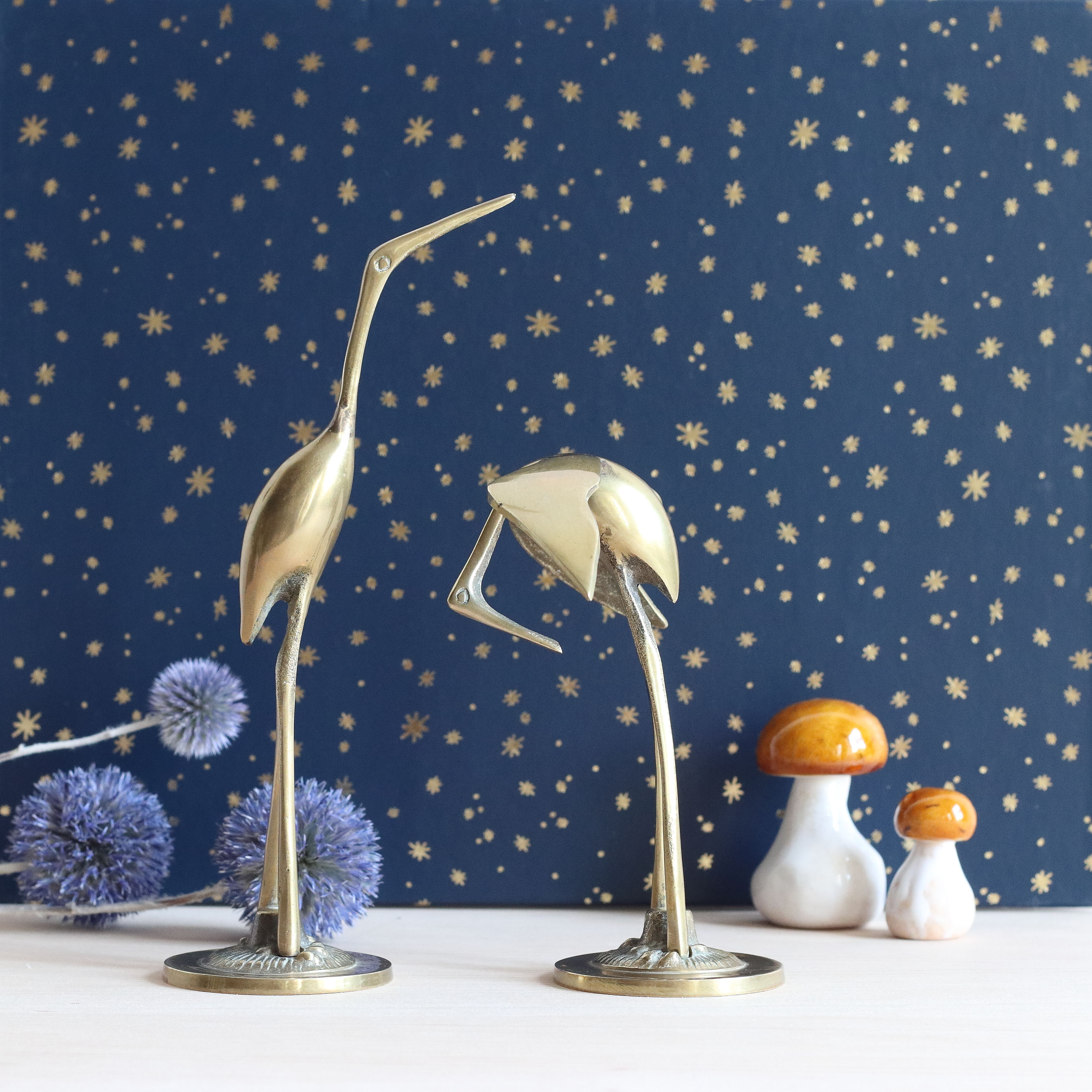 Couple of herons, golden brass