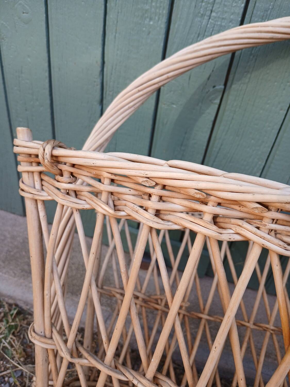 Antique wicker magazine rack