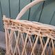 Antique wicker magazine rack