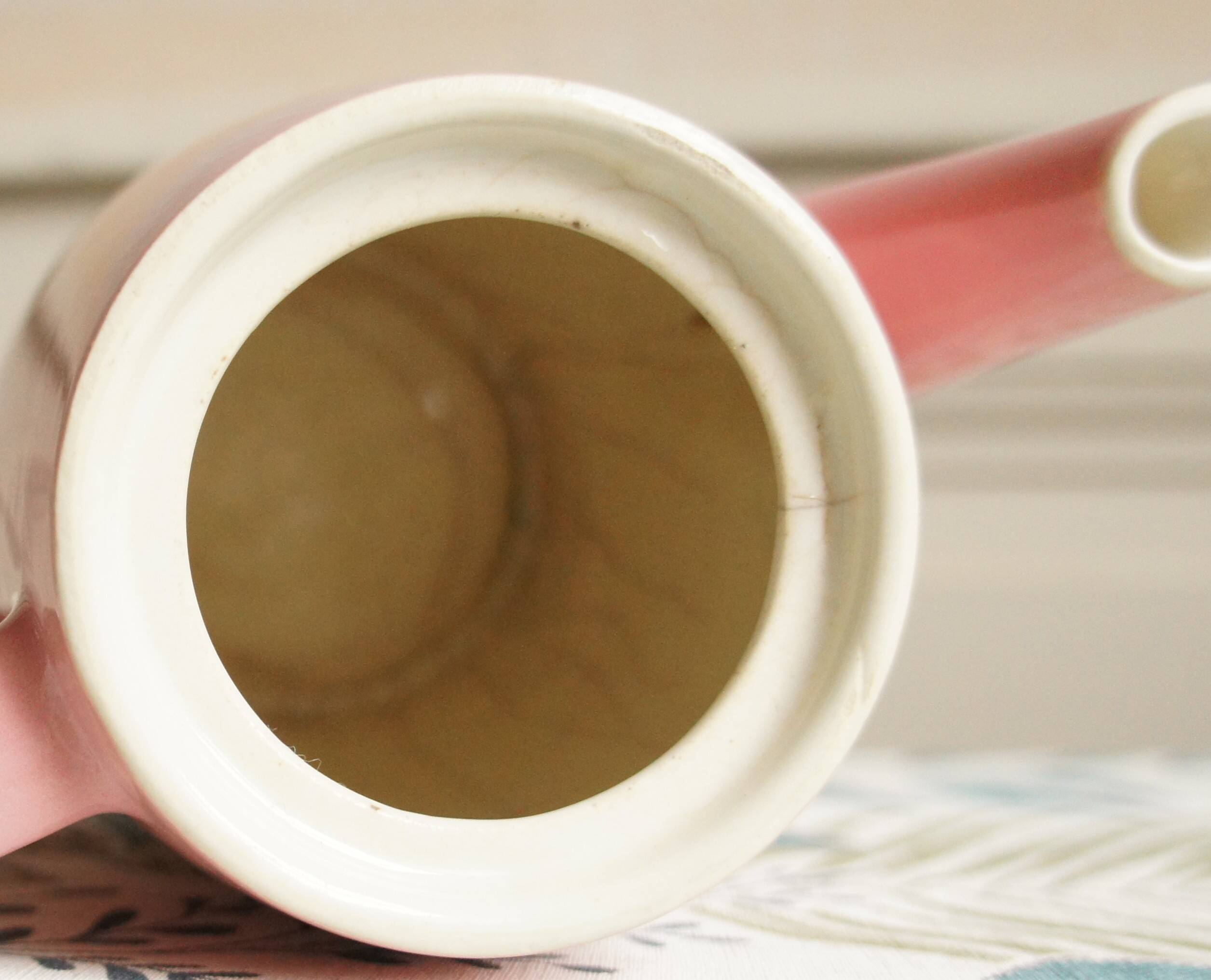 Pink porcelain coffee or teapot