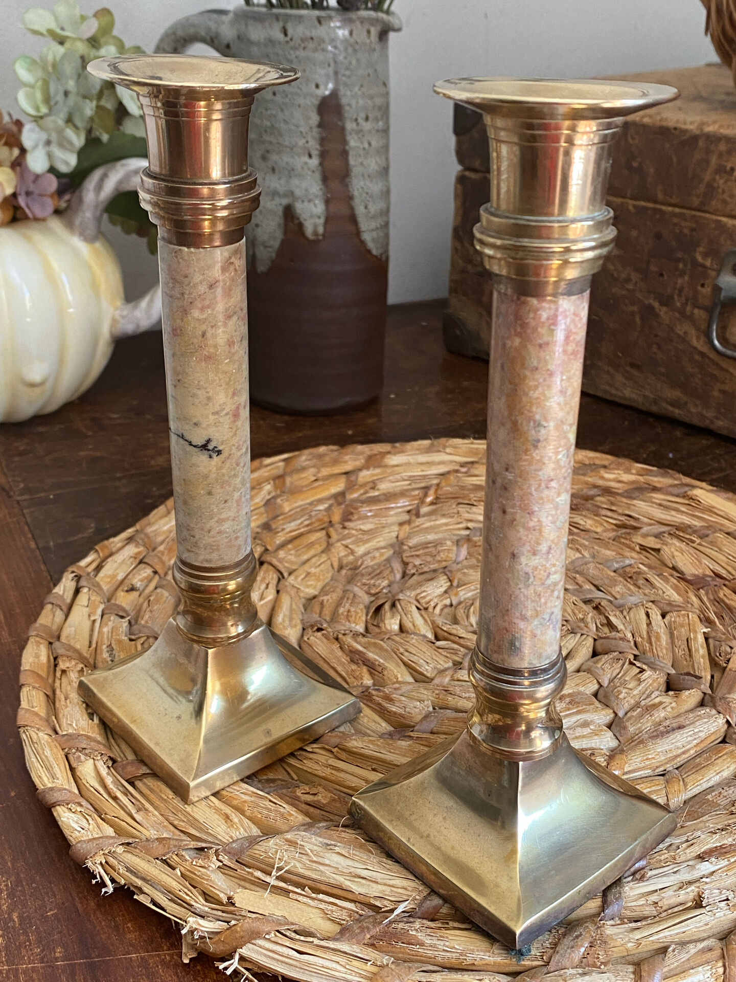 Pair of brass and stone candlesticks