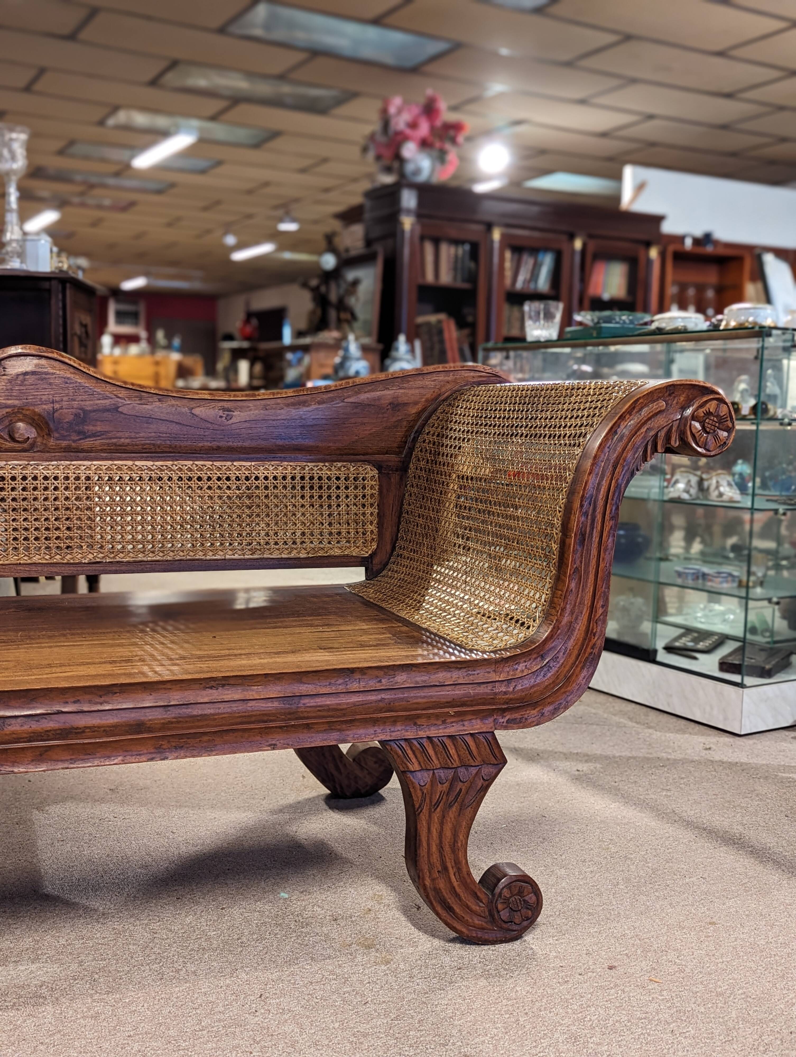 Large colonial caned bench