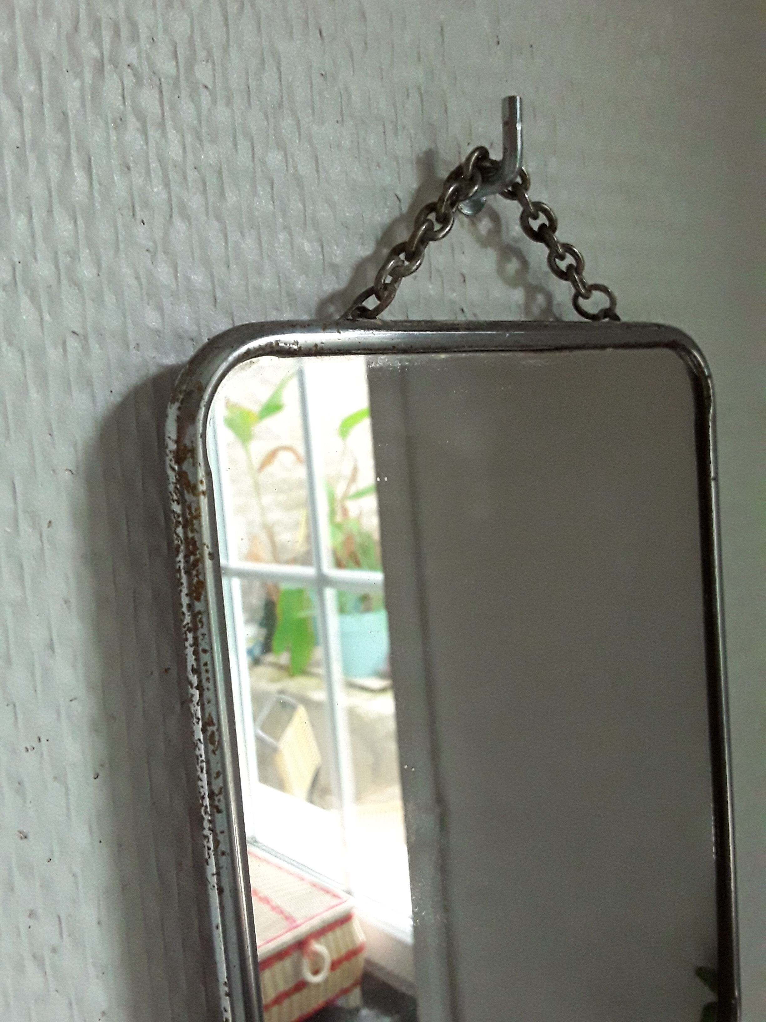 Vintage barber mirror with chain