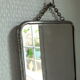 Vintage barber mirror with chain