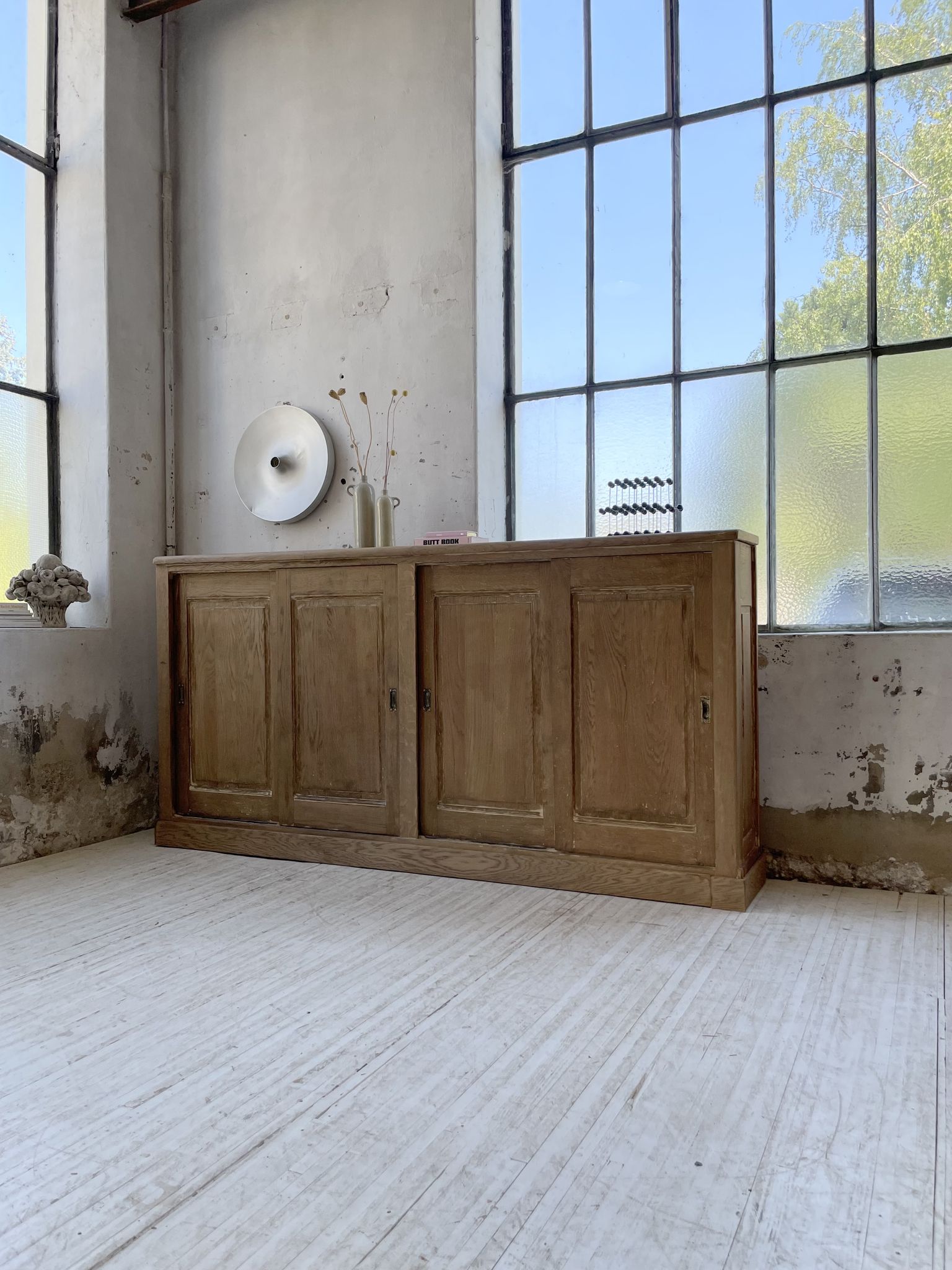 Large row of solid oak loom sliding doors