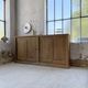 Large row of solid oak loom sliding doors