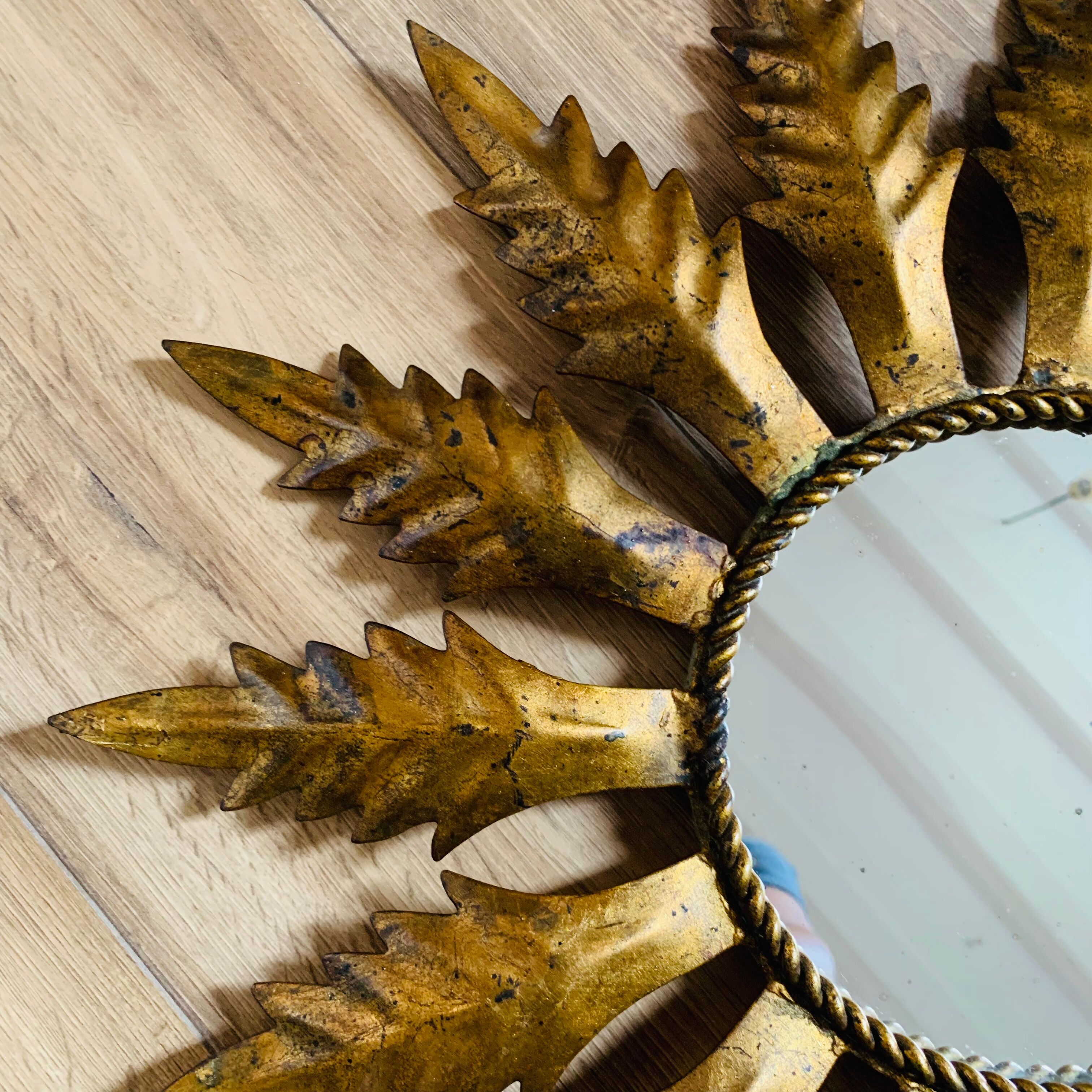 Golden metal sun mirror