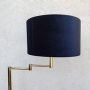 Articulated floor lamp in brass with a velvet shade, 1970.