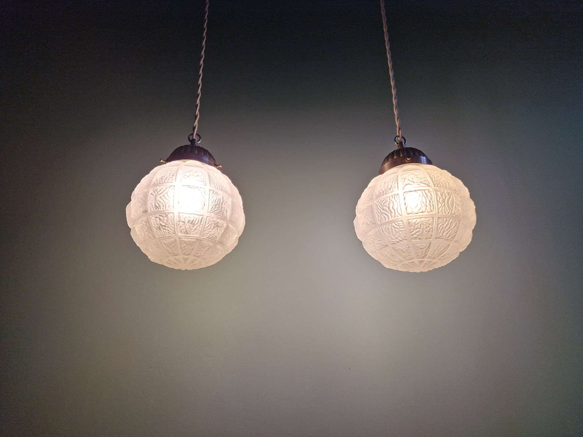 Pair of Art Deco frosted glass pendants, 1920s-30s.