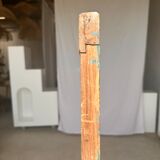 Rectangular Indonesian construction element with blue and yellow plant in carved wood