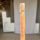Rectangular Indonesian construction element with blue and yellow plant in carved wood