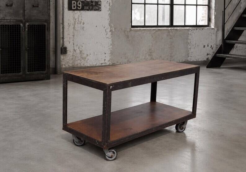 Industrial coffee table in metal and wood, wheeled table, trolley, vintage table, interior decoration.