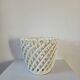 Woven ceramic plant pot