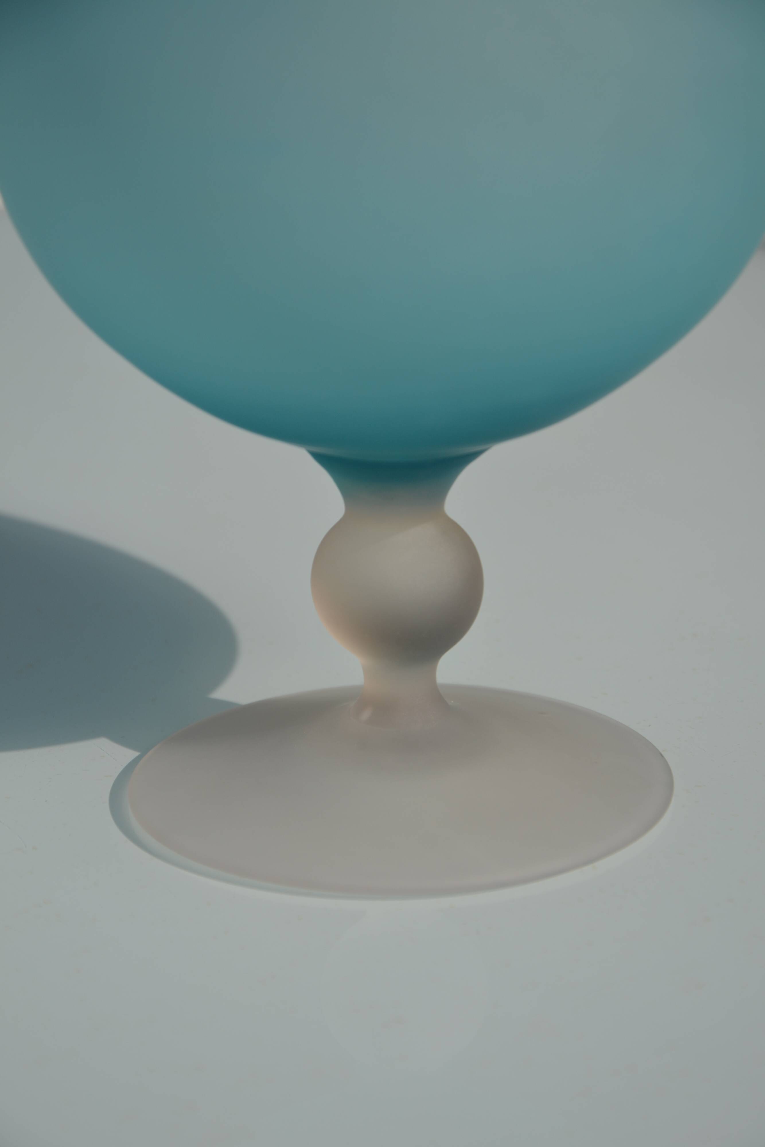 Blue frosted glass bottle/vase on foot