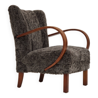 1950s, Danish design, reupholstered armchair, genuine sheepskin "Wellington".
