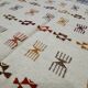 Handmade Berber patterned rug in natural wool