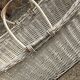 Rustic white woven wicker laundry basket — 1960s, large oval shape 77×41×25 cm