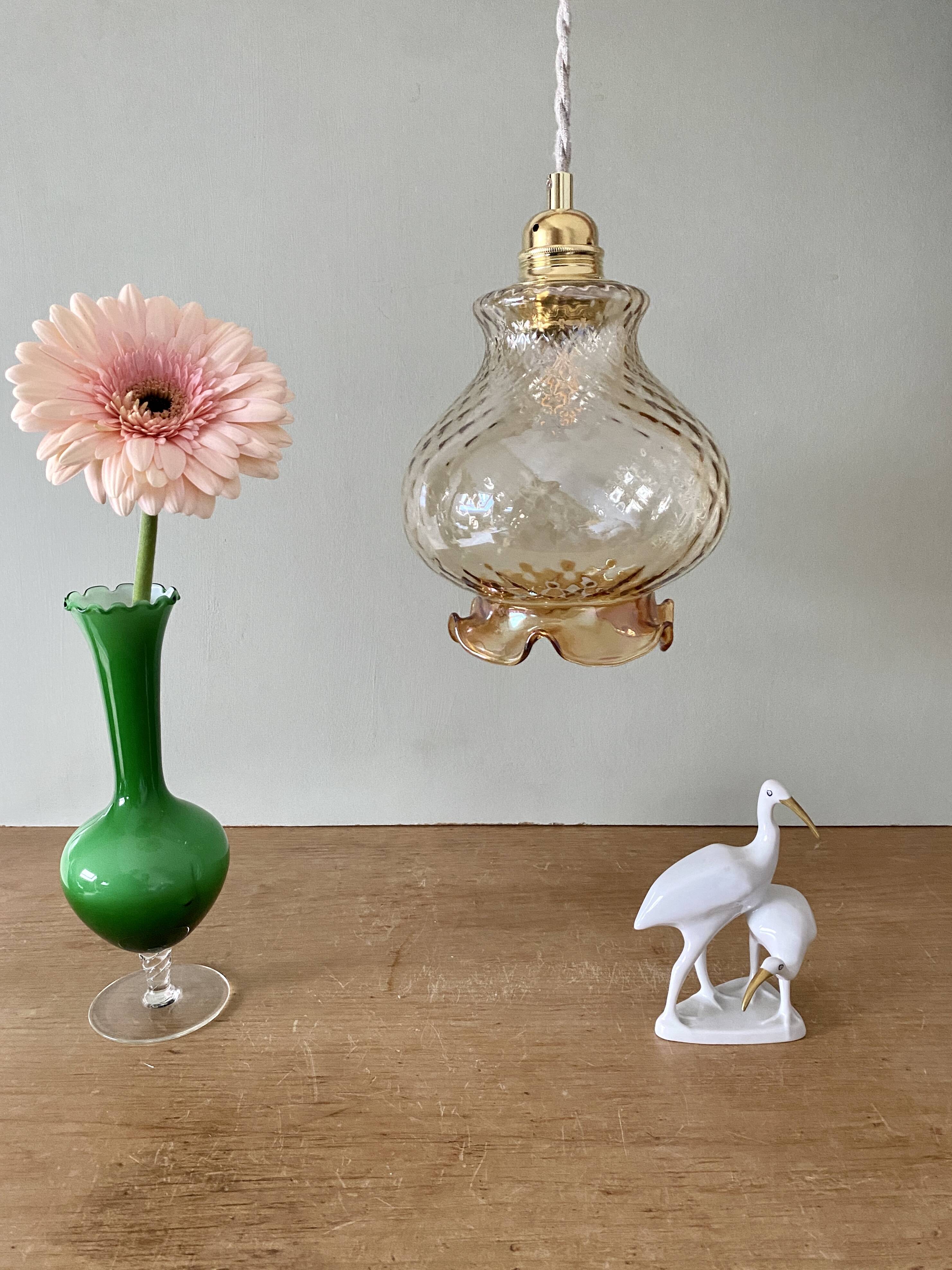 Vintage globe pendant light in amber glass