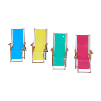 Set of four folding automatic deckchairs with Ergelax footrest never used