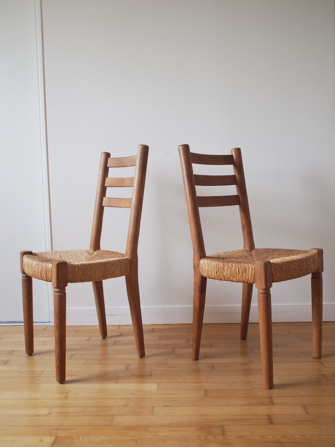 Pair of straw wood chairs