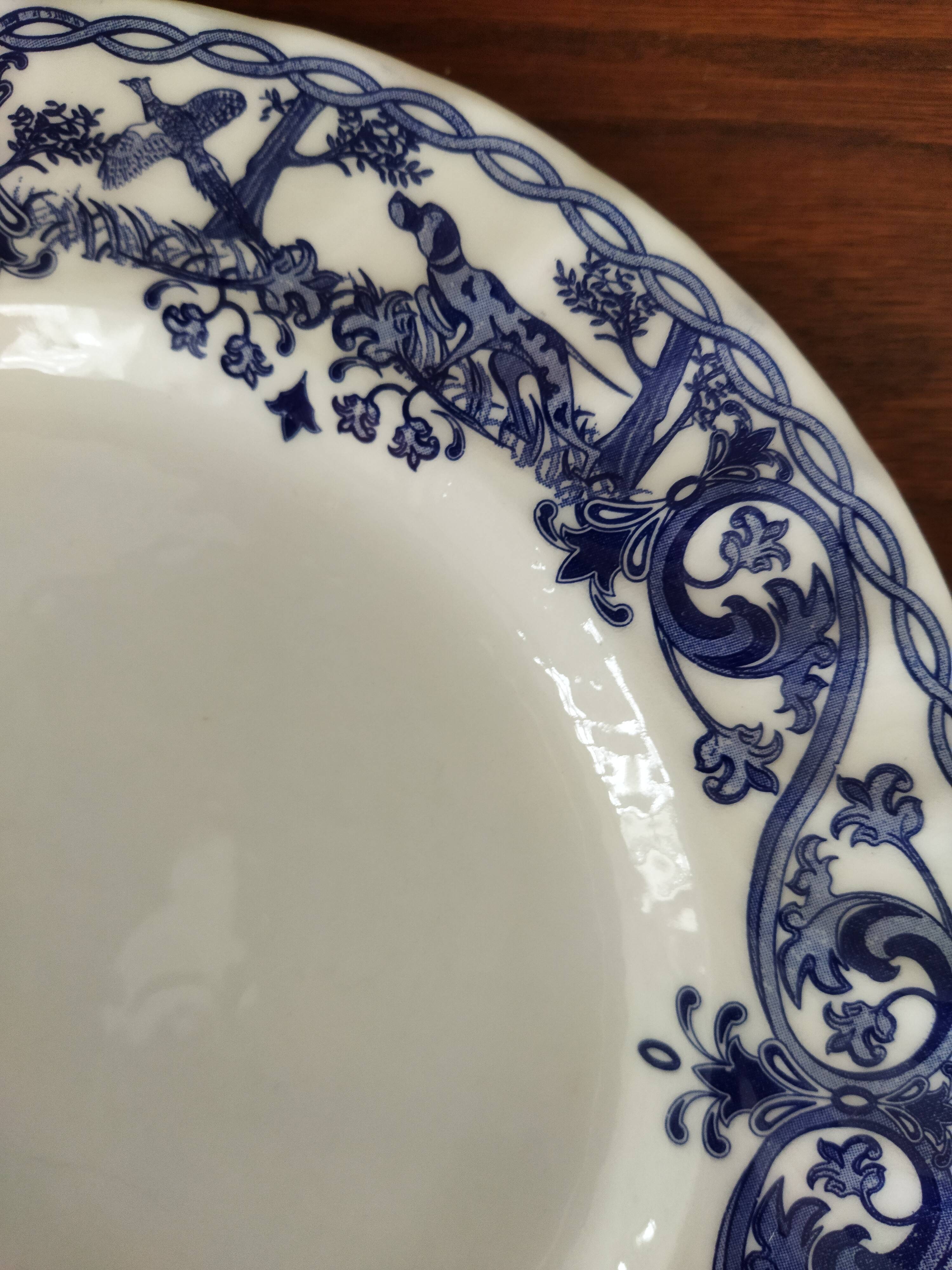 8 blue & white plates