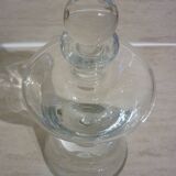 Wine decanter with cork on crystal base