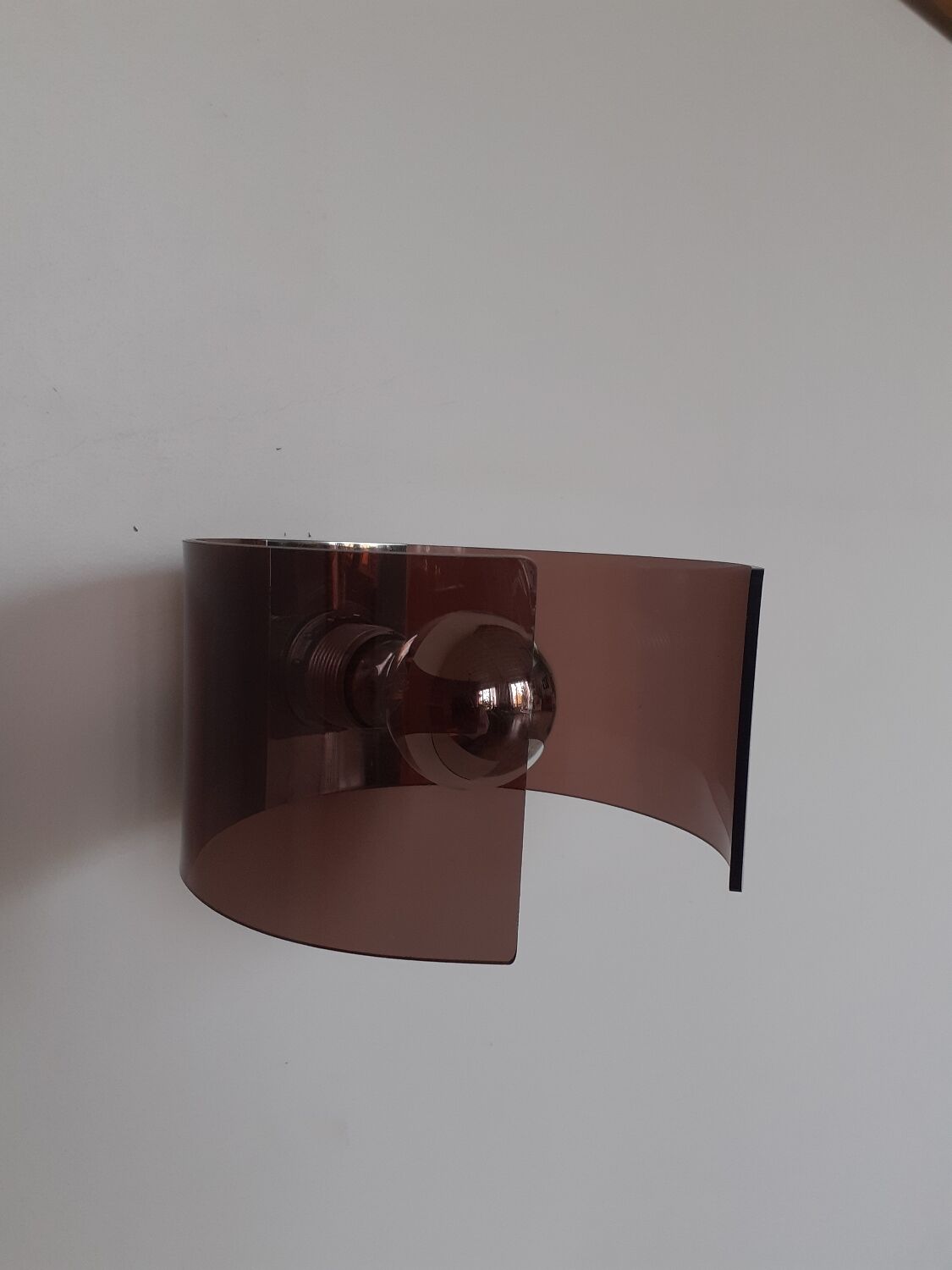 Space age plexiglass wall light.