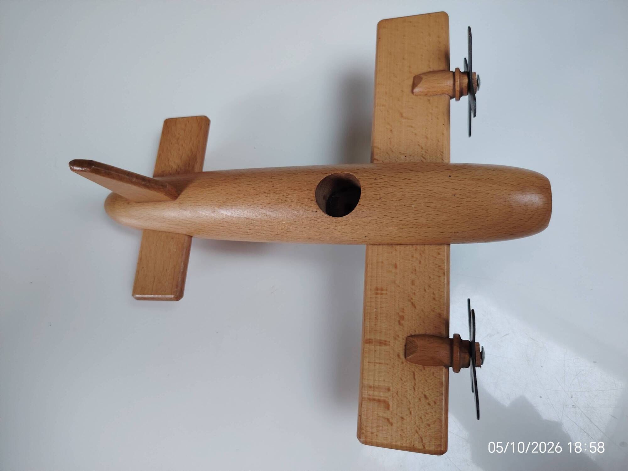 Vintage twin-engine aircraft in solid beech - Moulin Roty (1990s)
