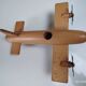 Vintage twin-engine aircraft in solid beech - Moulin Roty (1990s)