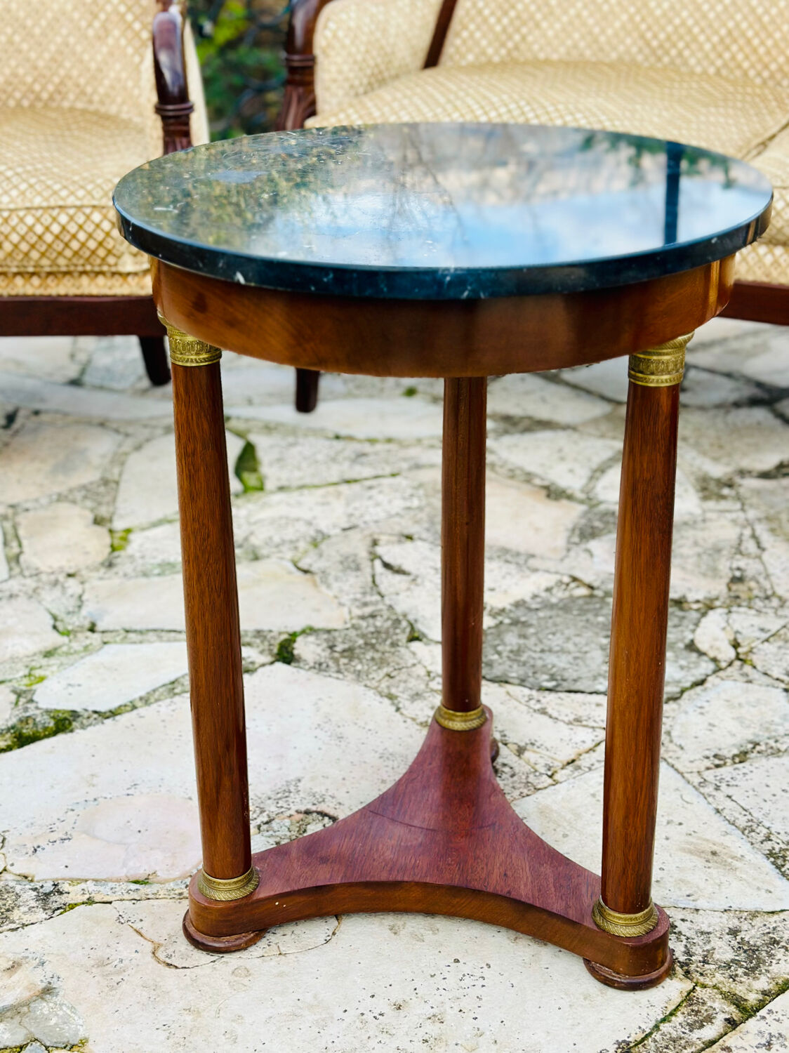 Empire side table in mahogany and mahogany veneer.